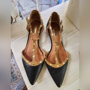 bebe Black and Tan Flats with Gold Studs